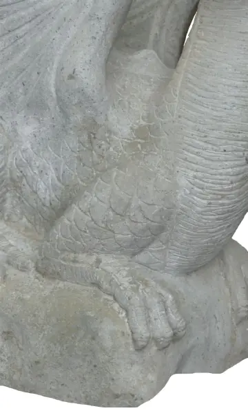Product image 5 of the product “Sitting dragon on stone, looking to the right. The height is about 65 cm. Riverstone, natural stone. ”